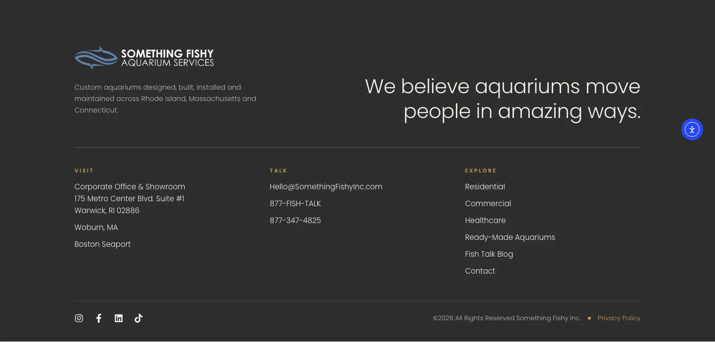 A redesigned site footer for Something Fishy on charcoal: brand column, navigation, a Locations column and contact lines.